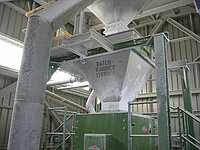 Bulk weigher for receiving and loading